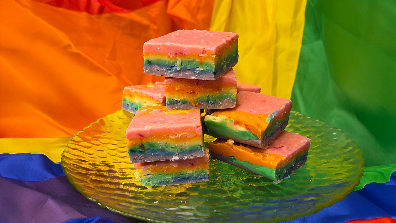 Assorted fudge and cookies on black slate